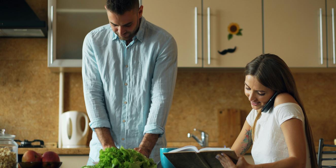 Couple working in the kitchen